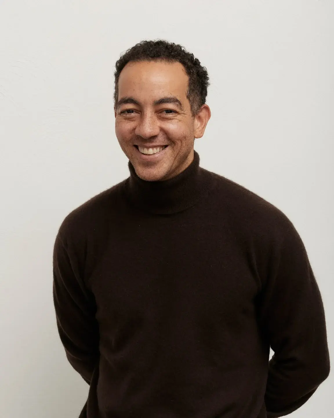 Dr Paul Munsanje, Medical Director of Slimbr, standing in his Dublin clinic
